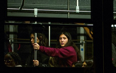 photo of students being evacuated via bus